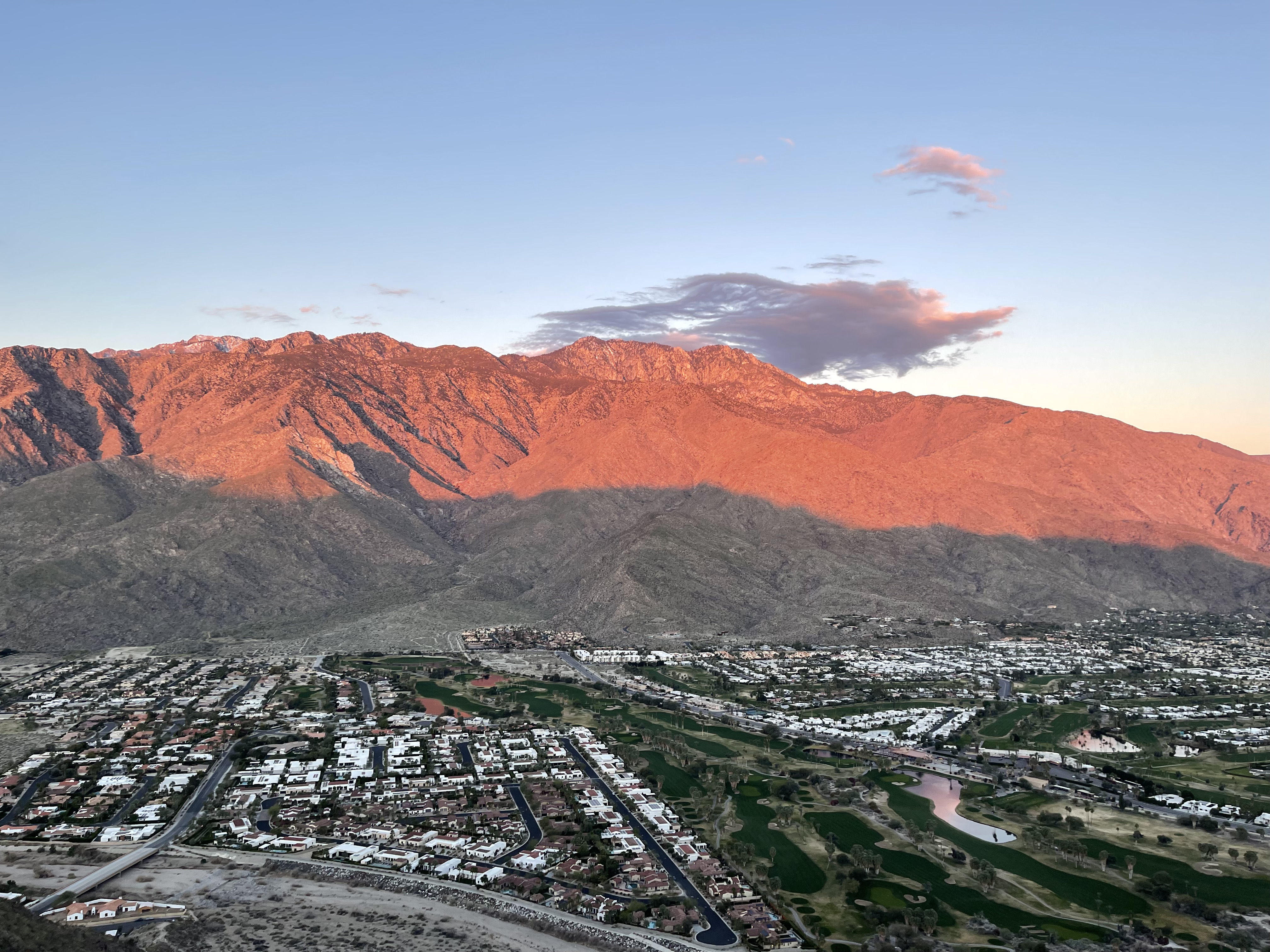 Coachella Valley at sunset, San Jacinto alpenglow over fairways and homes